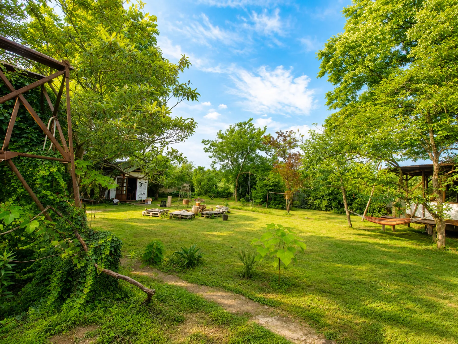 Campers and the garden at Nomad Garden